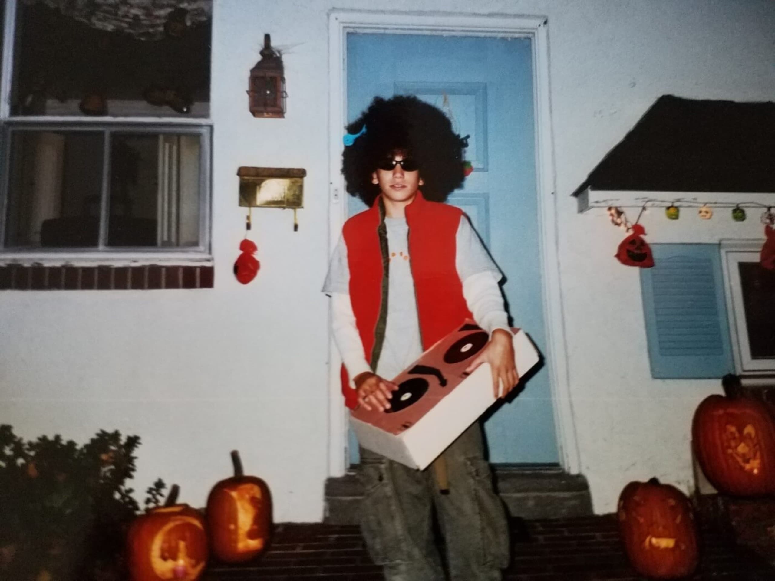 DJ Royale dressed up in DJ costume for Halloween