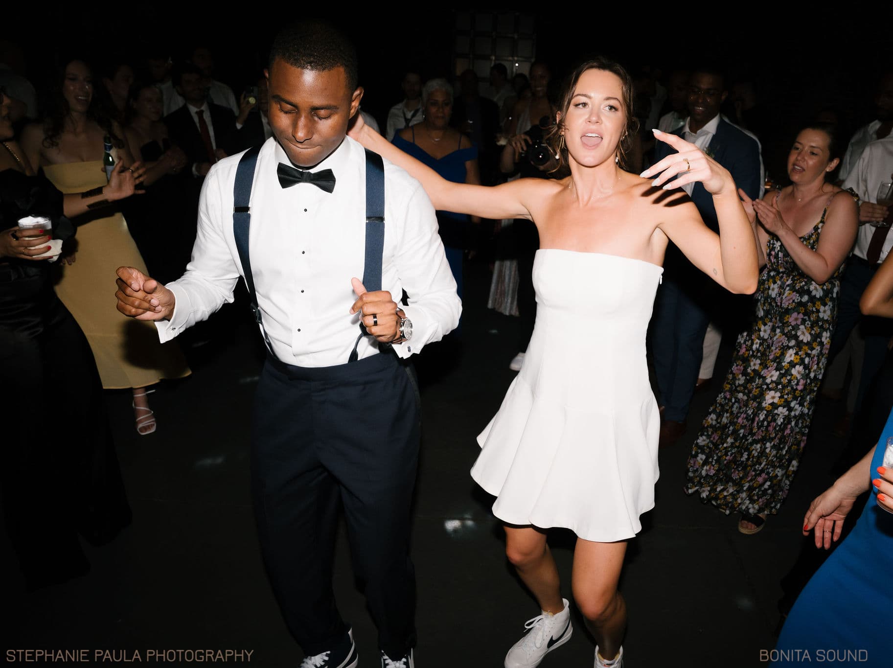A groom and bride dancing at their wedding reception