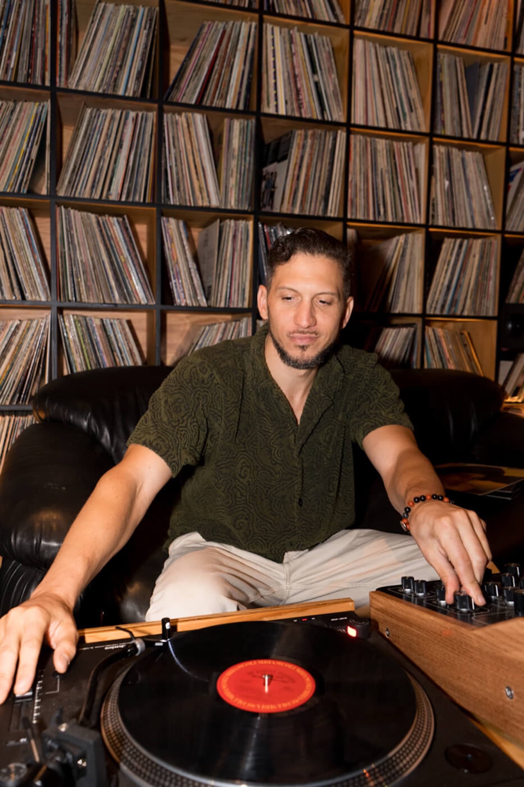 DJ Royale mixing vinyl records at LMNO in Philadelphia